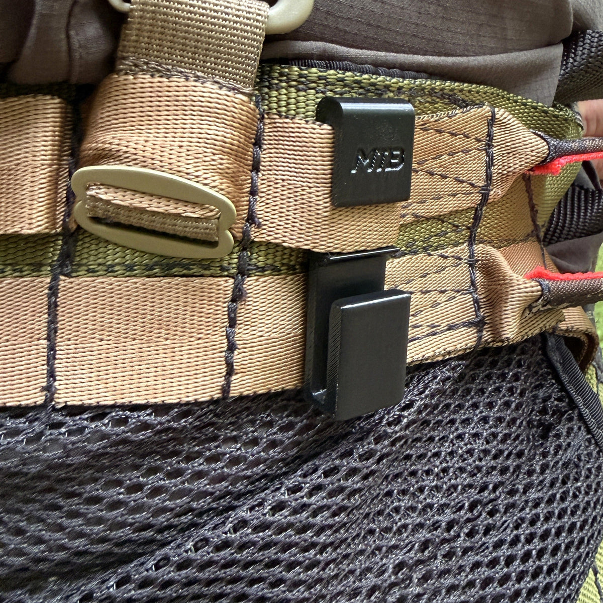 SC1 Cord Hook in use on hunting equipment